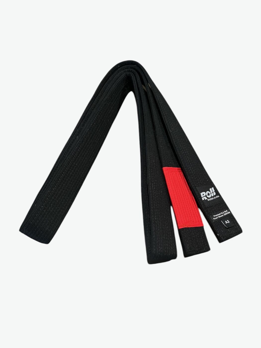 Roll Premium black belt with red tip bar, pearl weave, folded